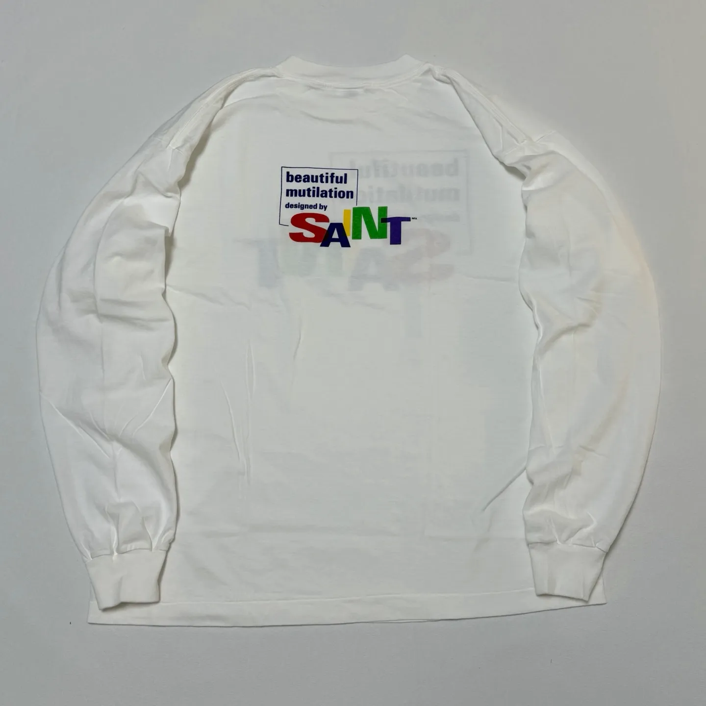 SAINT Mxxxxxx LS TEE/BEAUTIFUL SAINT/WHT Colorful SAINT slogan long-sleeved TEE White S-XL Cylindrical side seamless fabric Really made with care! Domestic printing factory OEM, original water slurry non-touch printing process, correct version, correct main mark/wash mark/little angel anti-counterfeiting mark